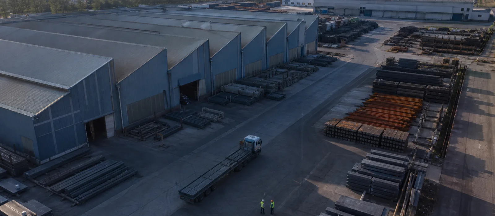Aerial view of the tool steel factory site, production halls and the outdoor billet yard