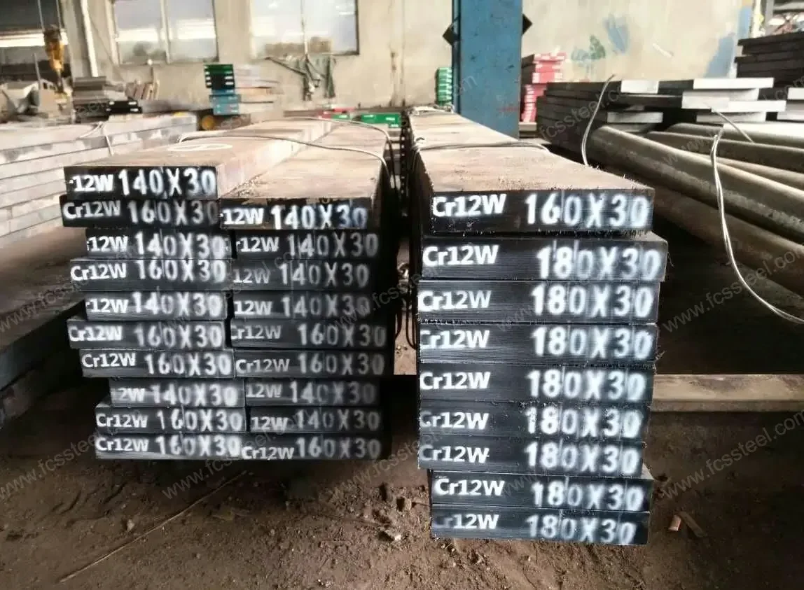 Cold work flat bar stacked in the long sections cut into shear blades and slitting knives