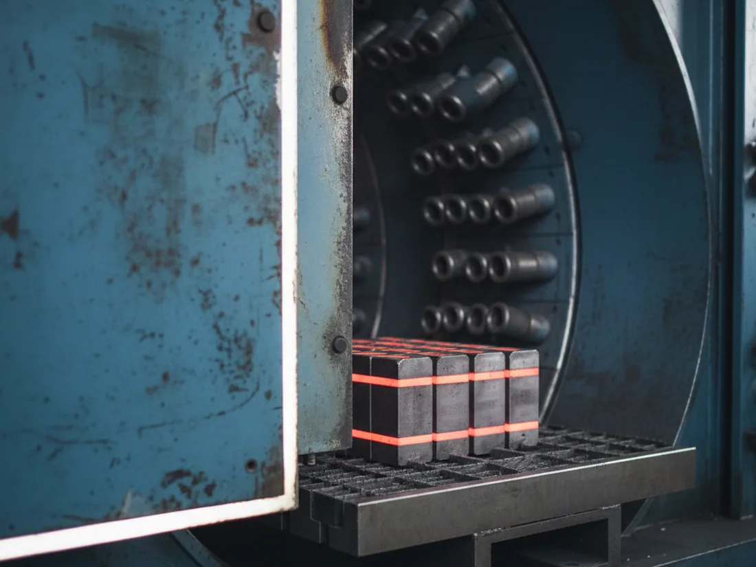 Gas quench chamber closing on a load of cold work die blocks