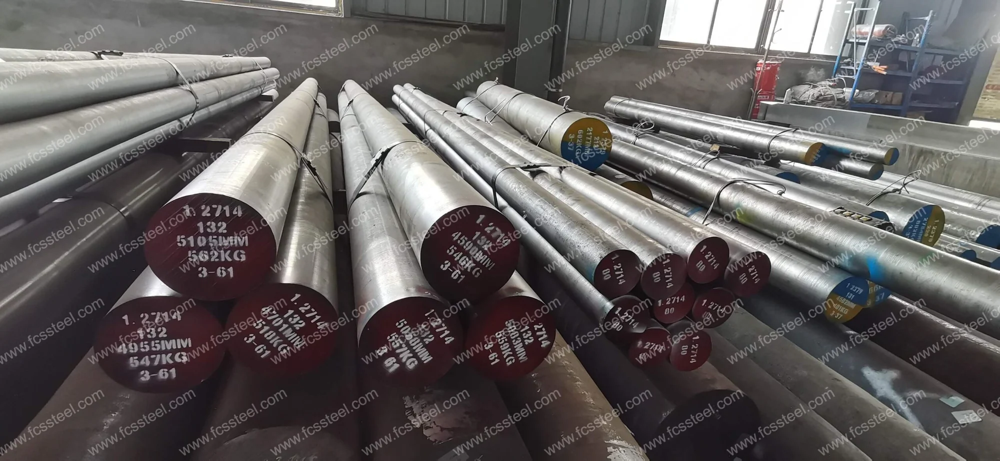 Heavy hot work round bar of the section where centre soundness decides whether the bar is usable