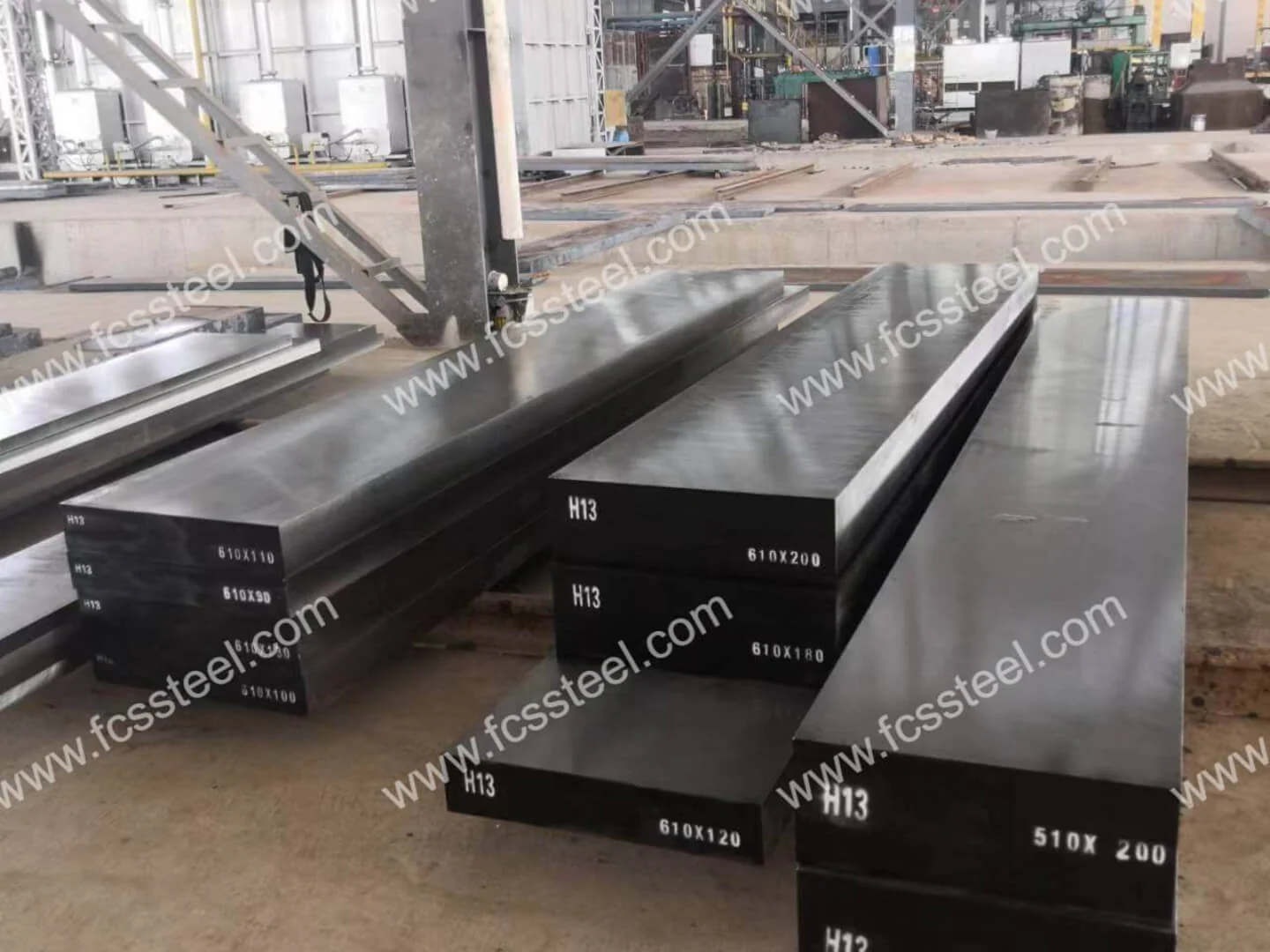 Forged H13 tool steel flat bar (1.2344 / SKD61) stacked and marked, of the section used for die casting cavity blocks