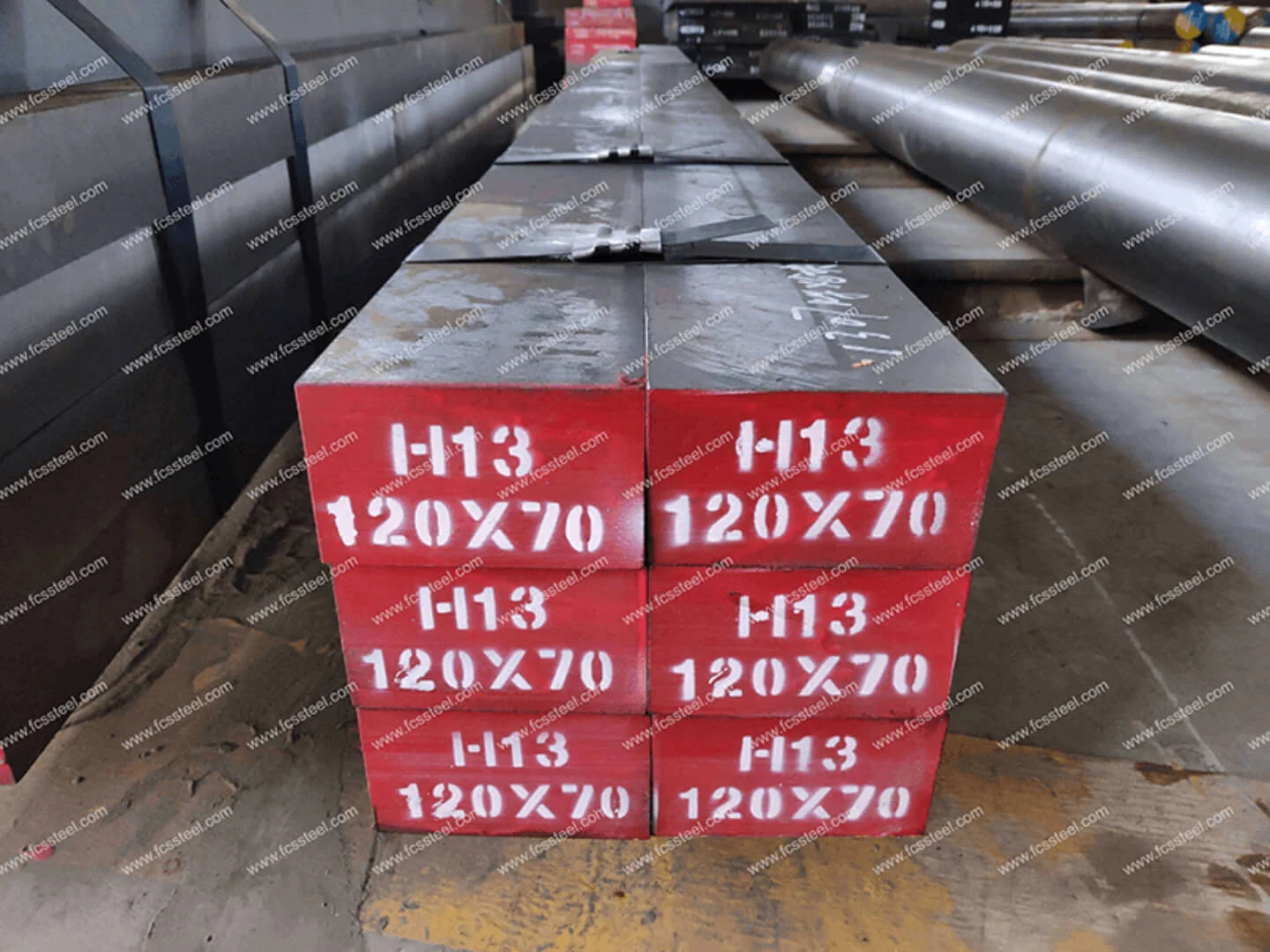 H13 tool steel flat bar stacked and labelled 120 by 70 mm in the finished goods store