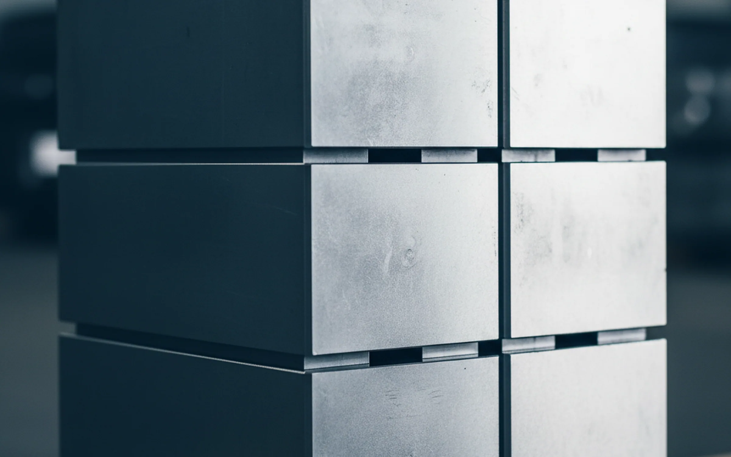 Stack of six face milled tool steel die blocks ready for layout in a tool room
